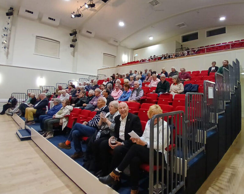 An expectant pre-show audience at Dereham Memorial Hall